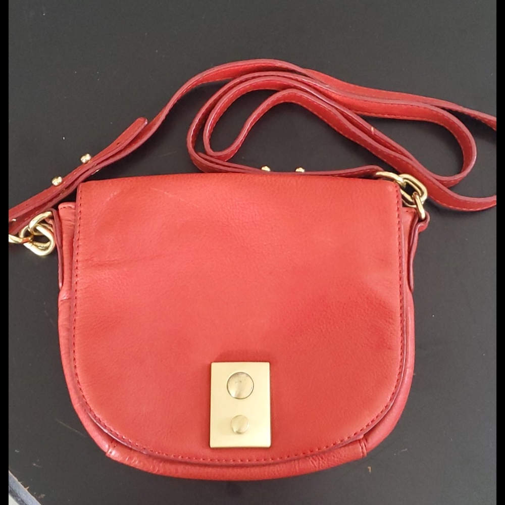 J Crew orange leather crossbody saddle bag